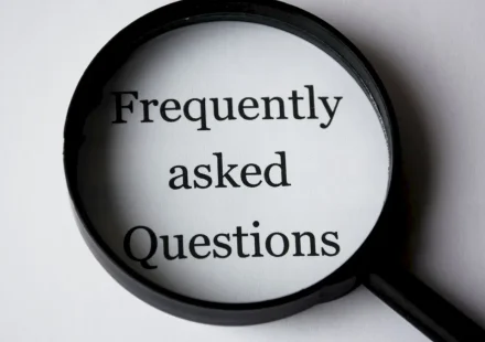 magnifying glass framing FAQ text